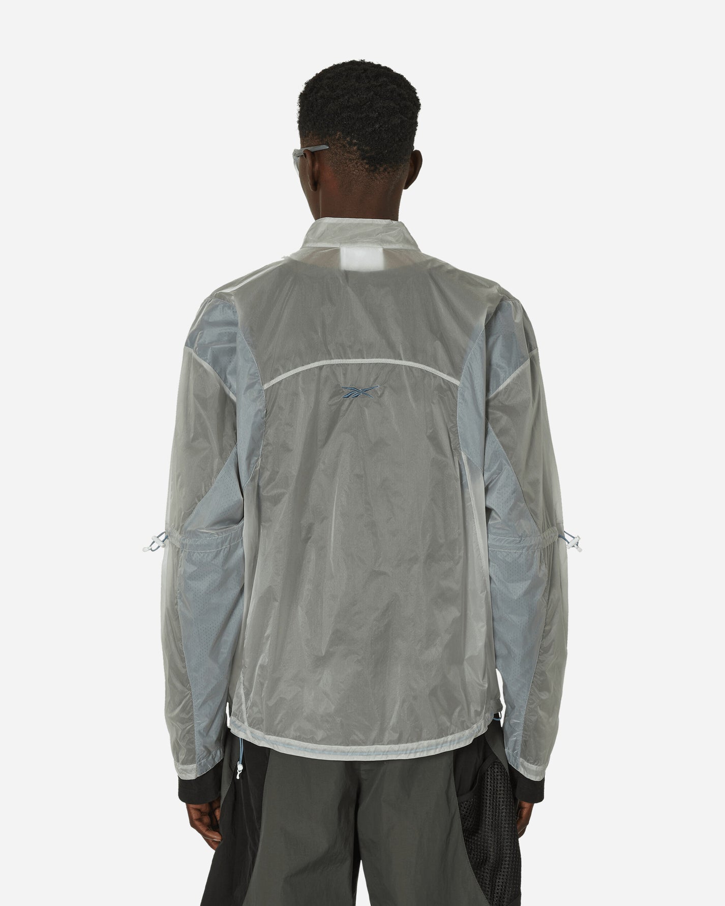 Reebok See Through Jacket Crystal Blue Coats and Jackets Jackets RMEA006C99FAB001